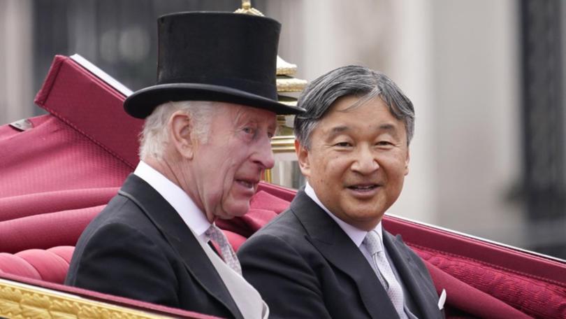 King Charles and Emperor Naruhito travelled to Buckingham Palace in a gold-edged carriage.