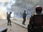 Anti-riot police have used tear gas, water cannons and guns to quell violent protests in Kenya. 