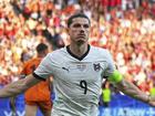 Austria's Marcel Sabitzer celebrates after scoring his side's third goal against the Netherlands.