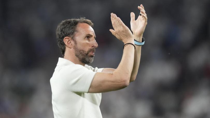 England manager Gareth Southgate applauded the fans, but spectators weren't impressed.  (AP PHOTO)