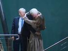 Julian Assange kisses his wife after touching down in Australia.