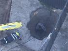 A man says he was scared after being trapped in a backyard hole in Hillarys, Perth.