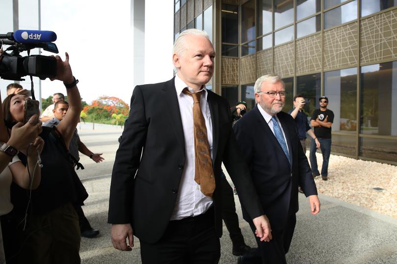 *** BESTPIX *** SAIPAN, NORTHERN MARIANA ISLANDS - JUNE 26: WikiLeaks founder Julian Assange is joined by Kevin Rudd, Australian Ambassador to the U.S. as he arrives to the United States Courthouse where he is expected to enter a guilty plea to an espionage charge ahead of his expected release on June 26, 2024 in Saipan, Northern Mariana Islands. Julian Assange, the WikiLeaks founder, was to appear before the U.S. District Court for the Northern Mariana Islands in Saipan on Wednesday for a change of plea hearing. Following his expected guilty plea to a felony charge under the Espionage Act, Assange is anticipated to be sentenced to time served and subsequently released, paving the way for his return to Australia after years of incarceration. (Photo by Chung Sung-Jun/Getty Images)