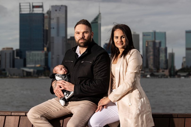 Joshua Bolton with his partner Sheldon and 4-week-old son Josh. 