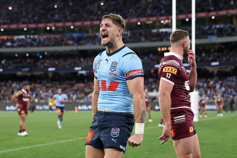 MELBOURNE, AUSTRALIA - JUNE 26: Zac Lomax of the Blues celebrates after scoring a try during game two of the men's State of Origin series between New South Wales Blues and Queensland Maroons at the Melbourne Cricket Ground on June 26, 2024 in Melbourne, Australia. (Photo by Cameron Spencer/Getty Images)
