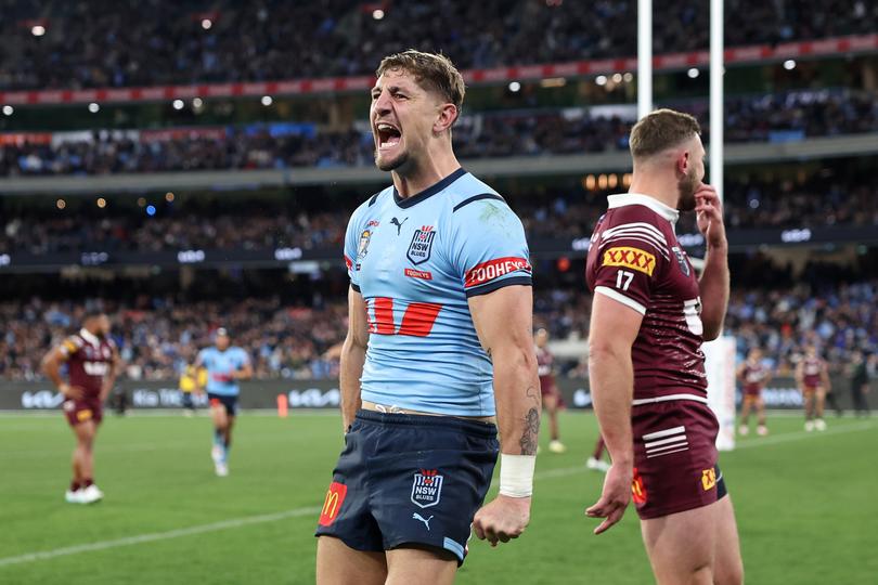 MELBOURNE, AUSTRALIA - JUNE 26:  Zac Lomax of the Blues celebrates after scoring a try during game two of the men's State of Origin series between New South Wales Blues and Queensland Maroons at the Melbourne Cricket Ground on June 26, 2024 in Melbourne, Australia. (Photo by Cameron Spencer/Getty Images)