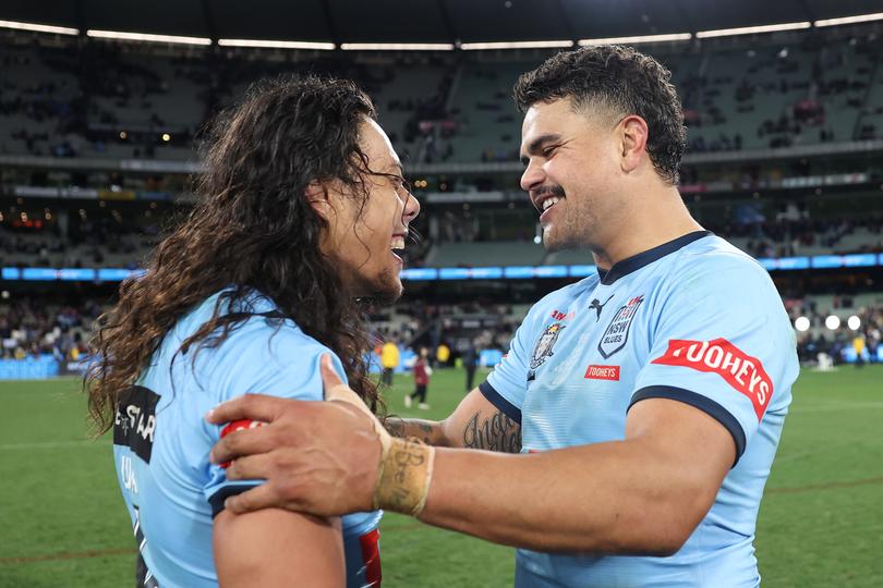 MELBOURNE, AUSTRALIA - JUNE 26: Latrell Mitchell and Jarome Luai of the Blues celebrate after winning game two of the men's State of Origin series between New South Wales Blues and Queensland Maroons at the Melbourne Cricket Ground on June 26, 2024 in Melbourne, Australia. (Photo by Cameron Spencer/Getty Images)