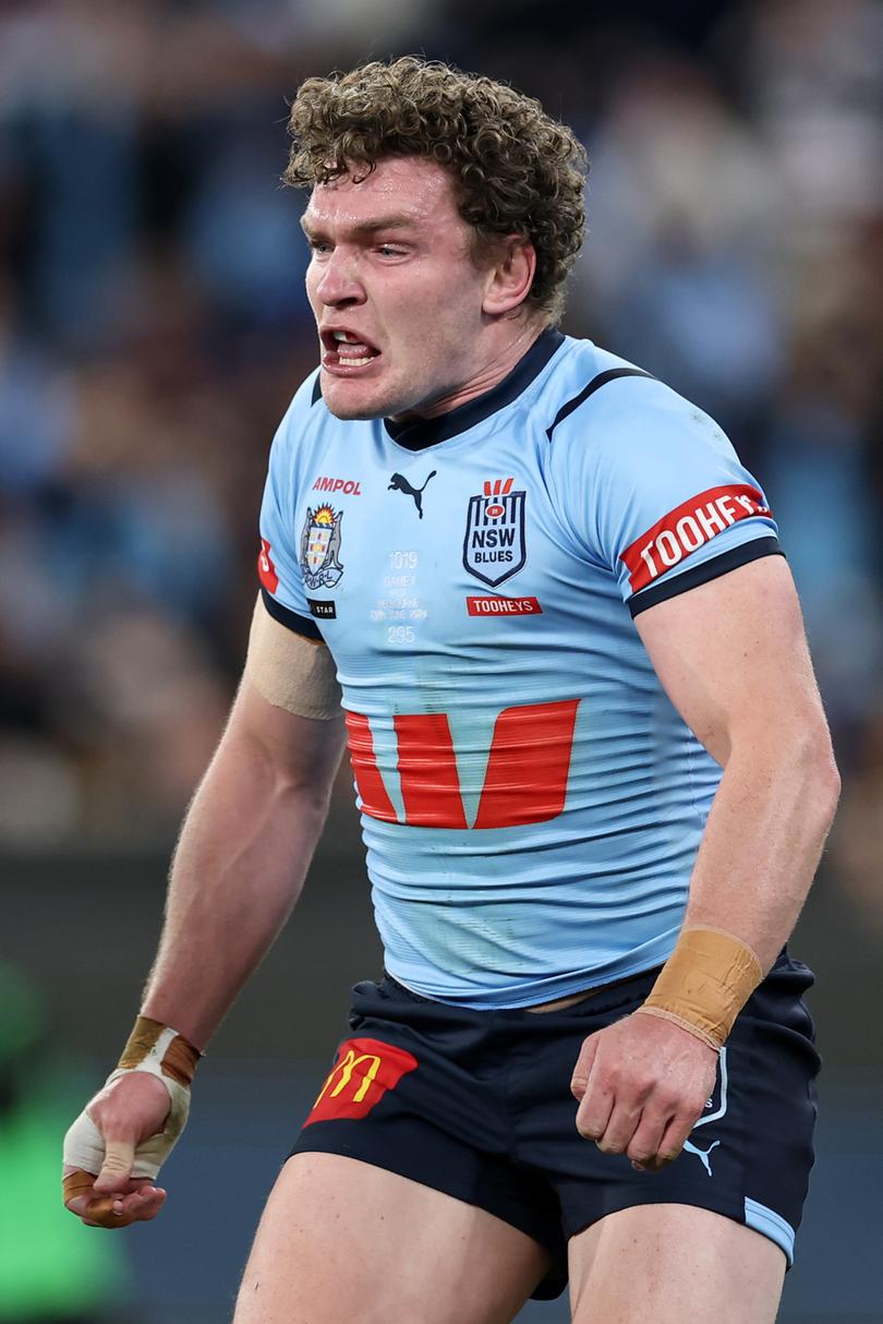 MELBOURNE, AUSTRALIA - JUNE 26:  Liam Martin of the Blues celebrates after scoring a try during game two of the men's State of Origin series between New South Wales Blues and Queensland Maroons at the Melbourne Cricket Ground on June 26, 2024 in Melbourne, Australia. (Photo by Cameron Spencer/Getty Images)