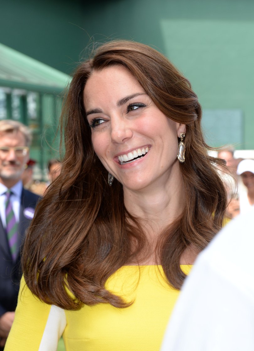 Traditionally Princess Catherine hands the trophies to the singles champions.