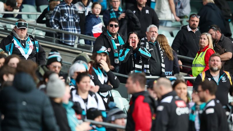 Port fans give head coach Ken Hinkley some advice as he leaves the field after the Brisbane loss. (Matt Turner/AAP PHOTOS)
