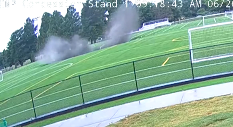 Video captured the moment the sinkhole swallowed part of the soccer pitch.