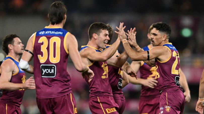 Brisbane have leapt to fifth on the ladder with a thrilling five-point win over Melbourne. (Darren England/AAP PHOTOS)