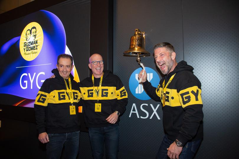 Guzman y Gomez Co- Founder Robert Hazan Co- CEOs Steven Marks and Hilton Brett  ring the bell at the Guzman y Gomez floating at the ASX in Sydney on June 20, 2024.