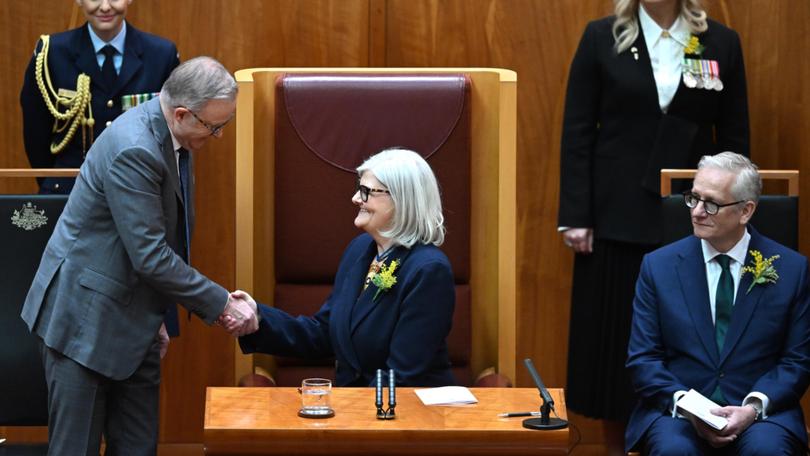 New Governor-General of Australia Sam Mostyn shakes hands with Australian Prime Minister Anthony Albanese during the swearing in ceremony at Parliament House.