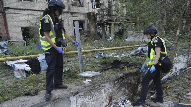 At least one person was killed after Russian glide bombs struck near a postal warehouse in Kharkiv.