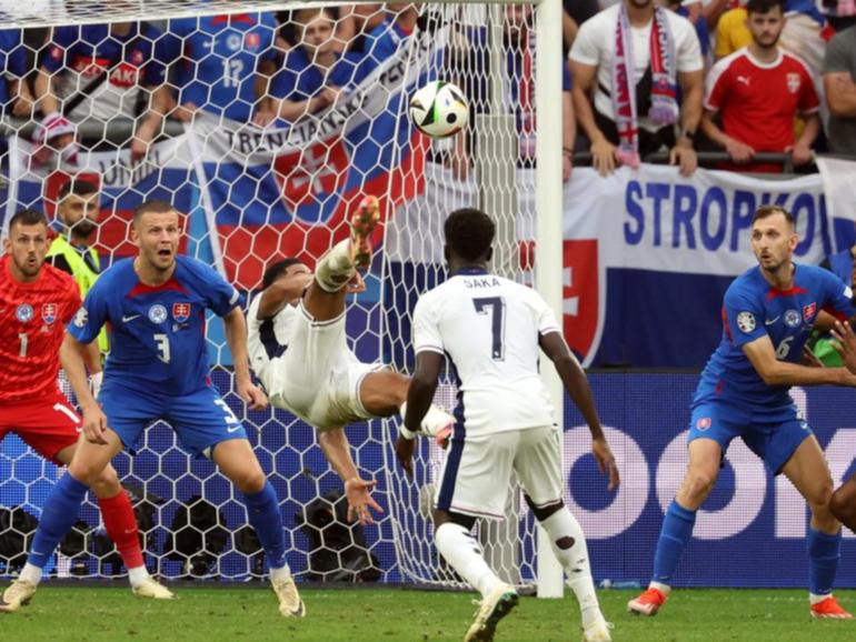 Jude Bellingham (centre) rescued England with a spectacular overhead equaliser against Slovakia. (EPA PHOTO)