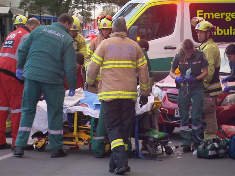 A 43-year-old woman was injured when she was hit by a car while riding an electric scooter.