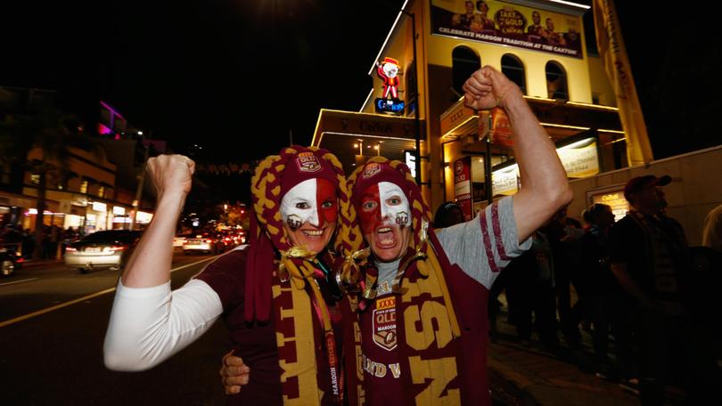 Queensland fans line Caxton St. 