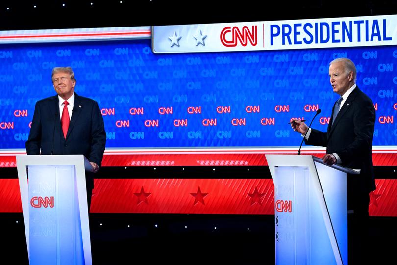 US President Joe Biden and former US President and Republican presidential candidate Donald Trump participate in the first presidential debate of the 2024 elections at CNN's studios in Atlanta, Georgia, on June 27, 2024. (Photo by ANDREW CABALLERO-REYNOLDS / AFP)