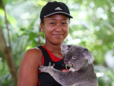 Naomi Osaka poses with Sprocket the Koala ahead of the 2019 Brisbane International at Lone Pine Koala Sanctuary.