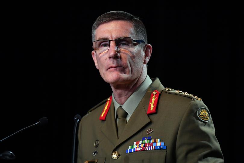 Chief of the Australian Defence Force (ADF) General Angus Campbell delivers the findings from the Inspector-General of the Australian Defence Force Afghanistan Inquiry, in Canberra, Thursday, November 19, 2020. A landmark report has shed light on alleged war crimes by Australian troops serving in Afghanistan. (AAP Image/Mick Tsikas) NO ARCHIVING