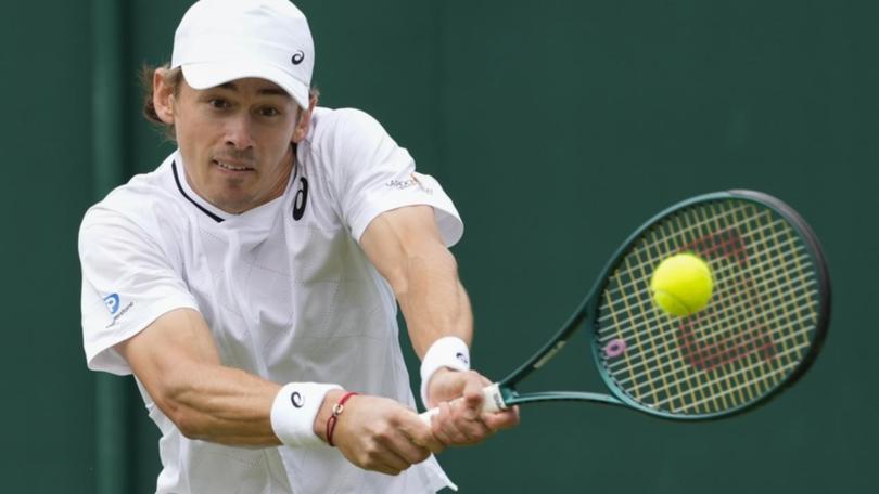 Alex de Minaur has beaten compatriot James Duckworth in the first round at Wimbledon.