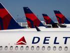 A Delta Air Lines flight has been forced to make an emergency landing after passengers became ill after being served spoilt food.