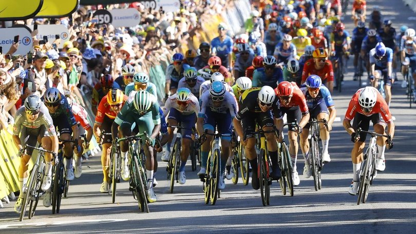 Dylan Groenewegen (far right) of Team Jayco AlUla breaks for the line to win the sixth stage sprint. (EPA PHOTO)