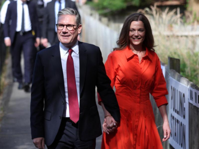 Labour leader Keir Starmer and wife Victoria Starmer arrive to vote