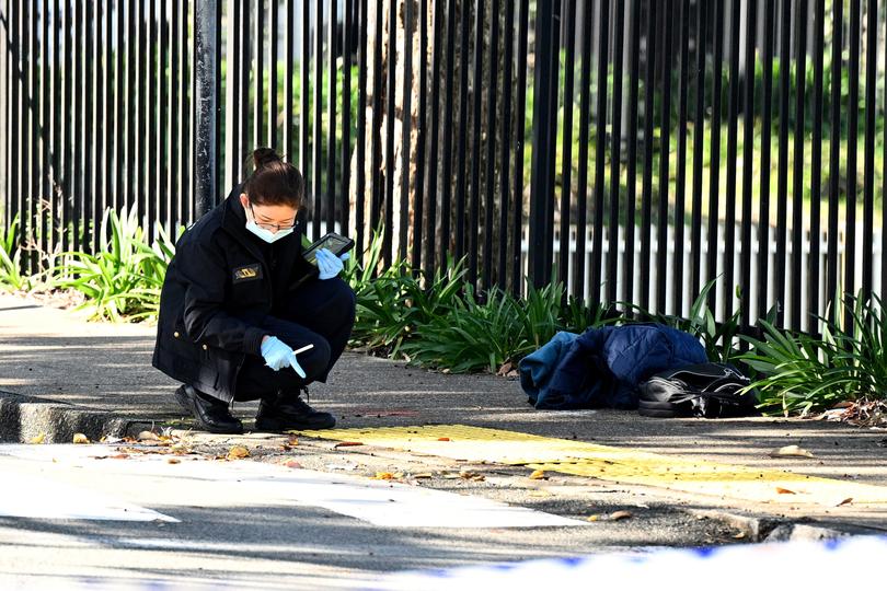 NSW Police and Forensic investigators at the scene of an alleged stabbing at University of Sydney, in Sydney, Tuesday, July 2, 2024. (AAP Image/Dan Himbrechts) NO ARCHIVING