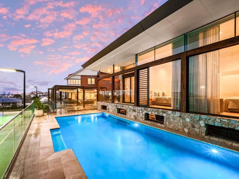 The 10-metre swimming pool overlooks the tennis court.