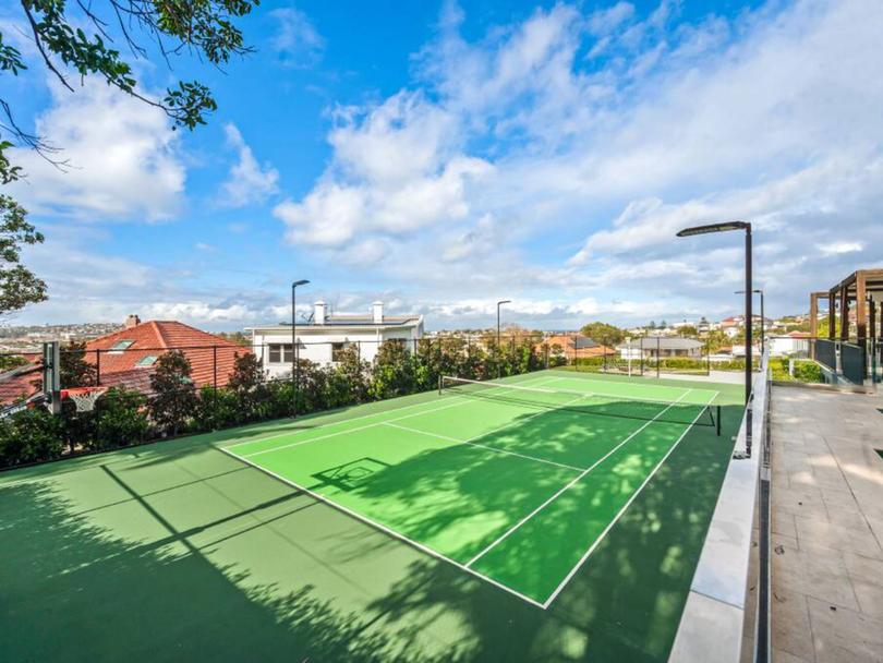 The full-sized tennis court.