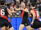 Zach Merrett (centre) led from the front in Essendon's 12-point win over Collingwood.  (James Ross/AAP PHOTOS)