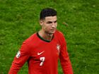 Cristiano Ronaldo of Portugal looks dejected after defeat to France in the quarter-final match.