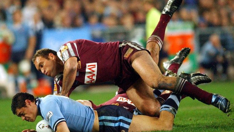 Queensland legend Gorden Tallis (top) has drawn a rebuke from NSW coach Michael Maguire. (Dean Lewins/AAP PHOTOS)
