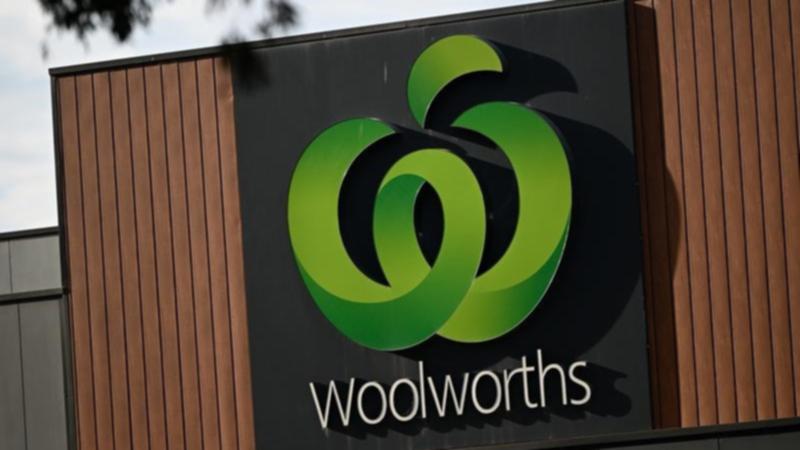 Stung after a public backlash, Woolworths is putting Australian flags back on its shelves.