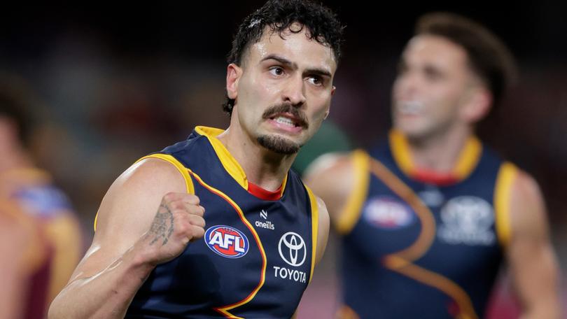 Izak Rankine of the Crows celebrates a goal against Brisbane.