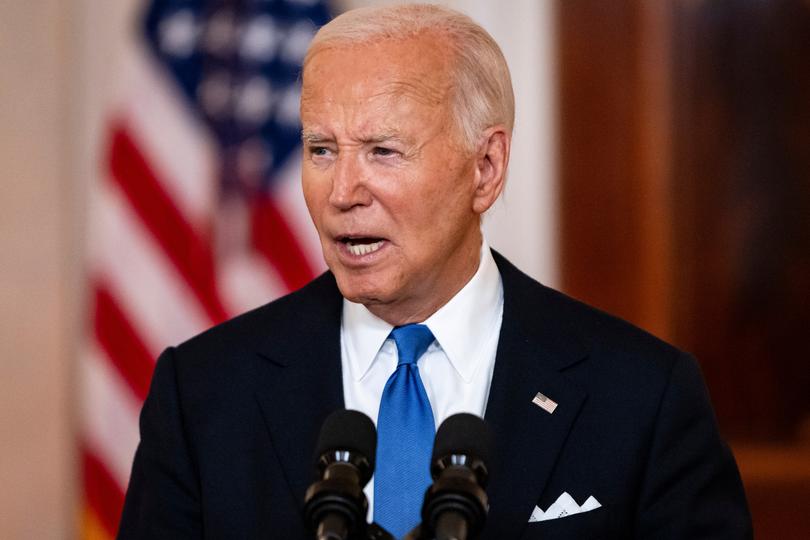 US President Joe Biden in the Cross Hall of the White House in Washington, DC, US, on Monday, July 1, 2024. The US Supreme Court ruled that Donald Trump has some immunity from criminal charges for trying to reverse the 2020 election results, all but ensuring that a trial won't happen before the November election. Photographer: Samuel Corum/Sipa/Bloomberg