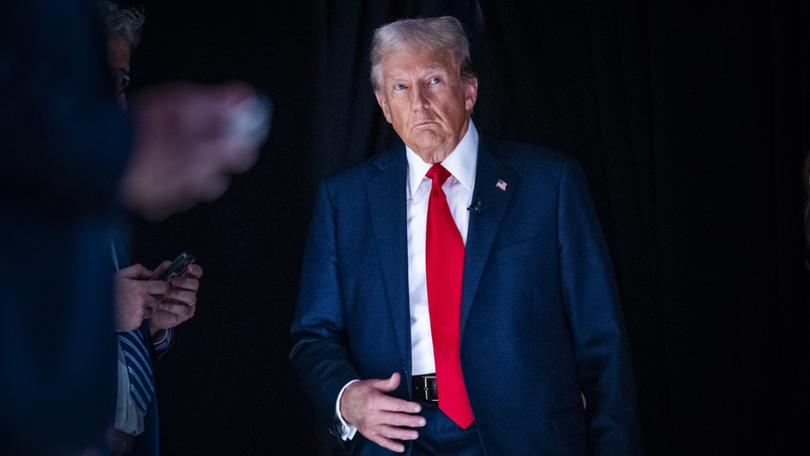 Former president Donald Trump returns from a break during the first presidential debate of the 2024 elections on June 27. MUST CREDIT: Jabin Botsford/The Washington Post