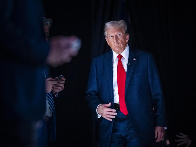 Former president Donald Trump returns from a break during the first presidential debate of the 2024 elections on June 27. MUST CREDIT: Jabin Botsford/The Washington Post