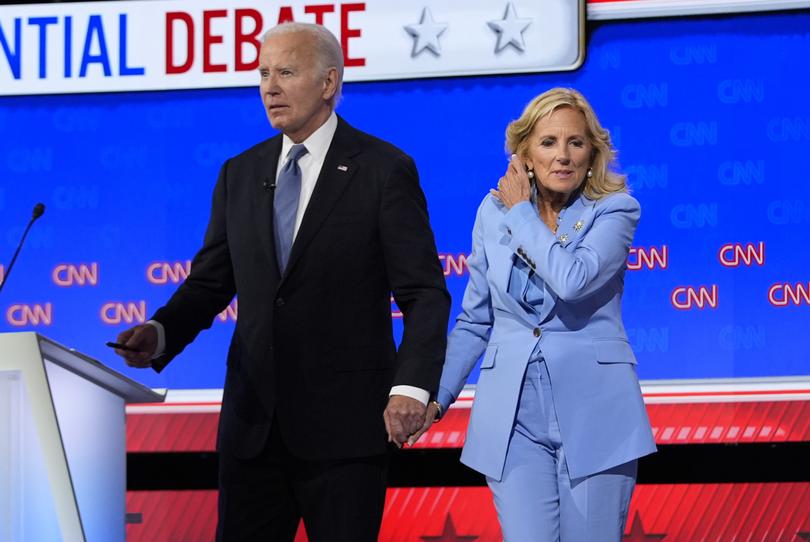 Jill Biden, right, stands with President Joe Biden at the conclusion of the presidential debate.