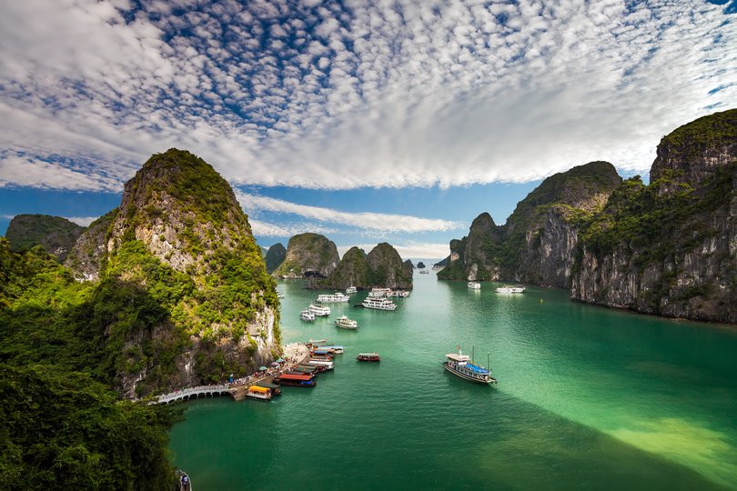 View of cruise ships and islands in Halong Bay, Vietnam.