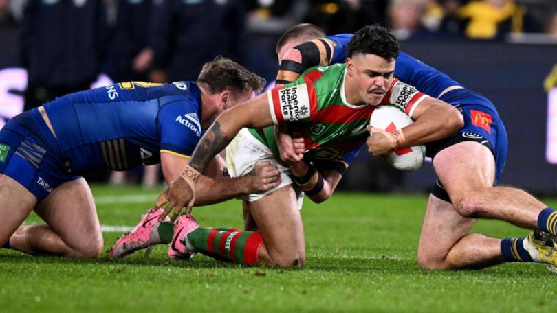 The Rabbitohs are hopeful Latrell Mitchell (centre) will be able to play again this sesaon. (Dan Himbrechts/AAP PHOTOS)