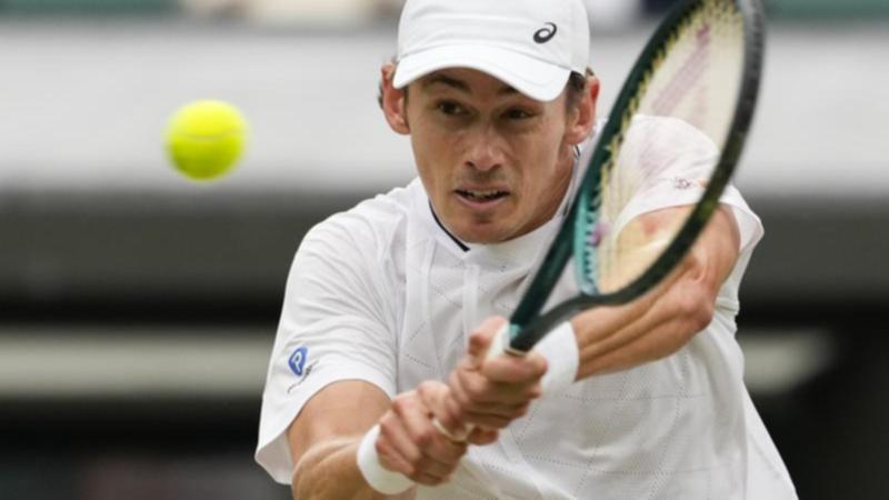 Australian No.1 Alex de Minaur will have plenty of backing from British fans against Novak Djokovic. (AP PHOTO)