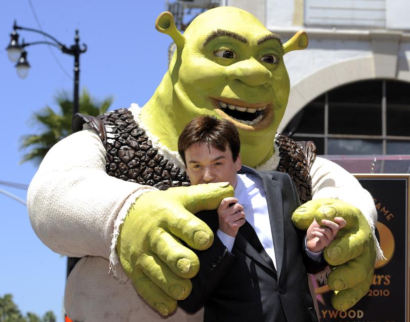 "Shrek" is joined by actor Mike Myers as the character receives a star on the Hollywood Walk of Fame in Los Angeles, Thursday, May 20, 2010. Myers provides the voice of Shrek in the animated film franchise. (AP Photo/Chris Pizzello)