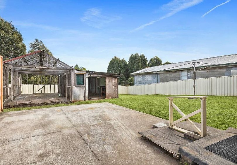 The home at 14 Jackson Avenue, Warrawong sold under the hammer.