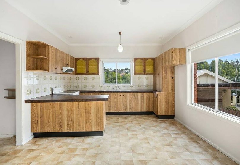 The home at 14 Jackson Avenue, Warrawong sold under the hammer.