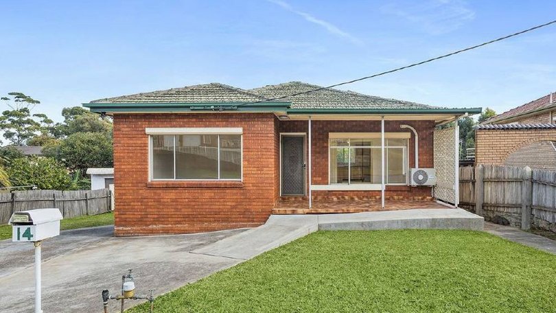 The home at 14 Jackson Avenue, Warrawong sold under the hammer.