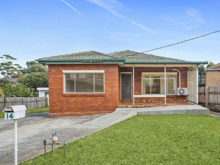 The home at 14 Jackson Avenue, Warrawong sold under the hammer.