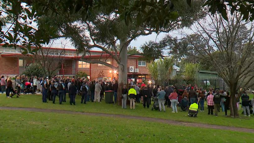 Hundreds of mourners turning up to show their support for the victims of the Lalor Park fire.